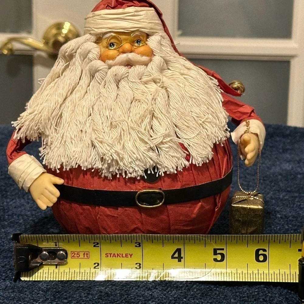 Delightful round Santa made with paper. Very cute!